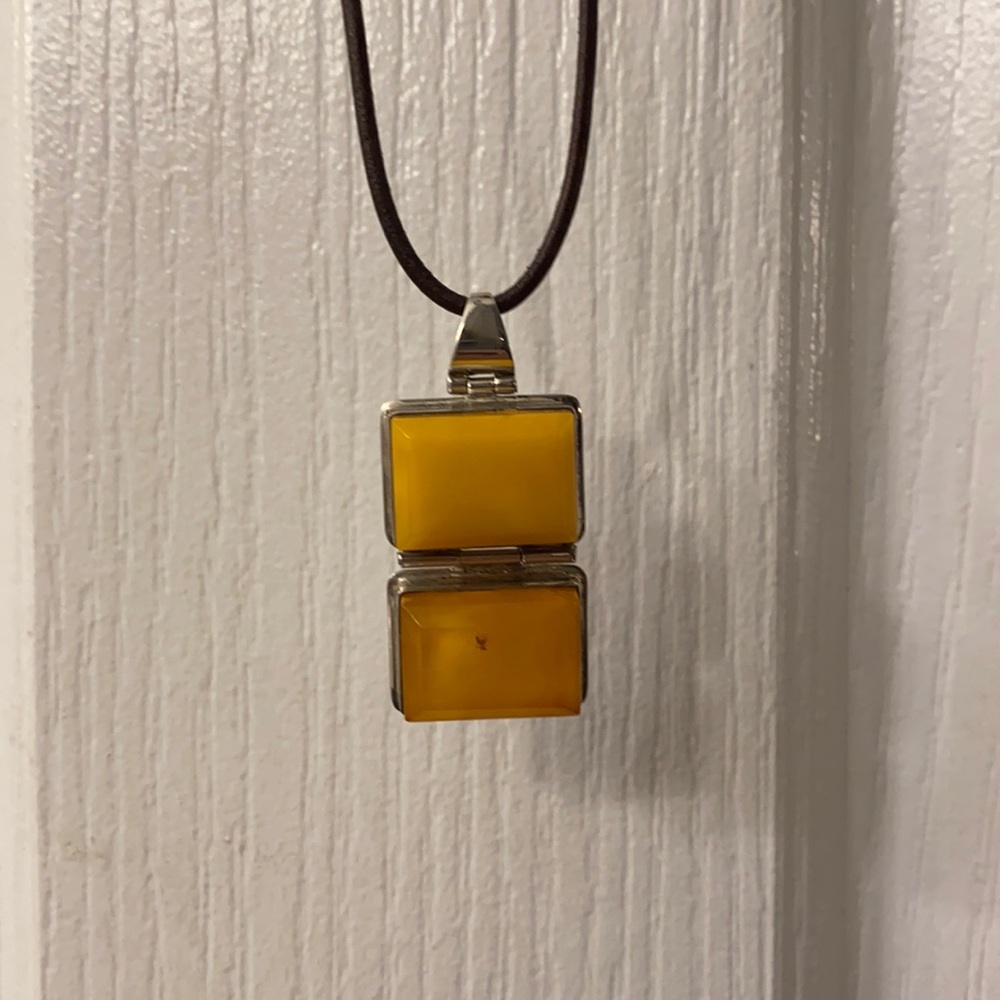 Authentic genuine Amber crystal necklace.  Purchased from upscale Jewlery store